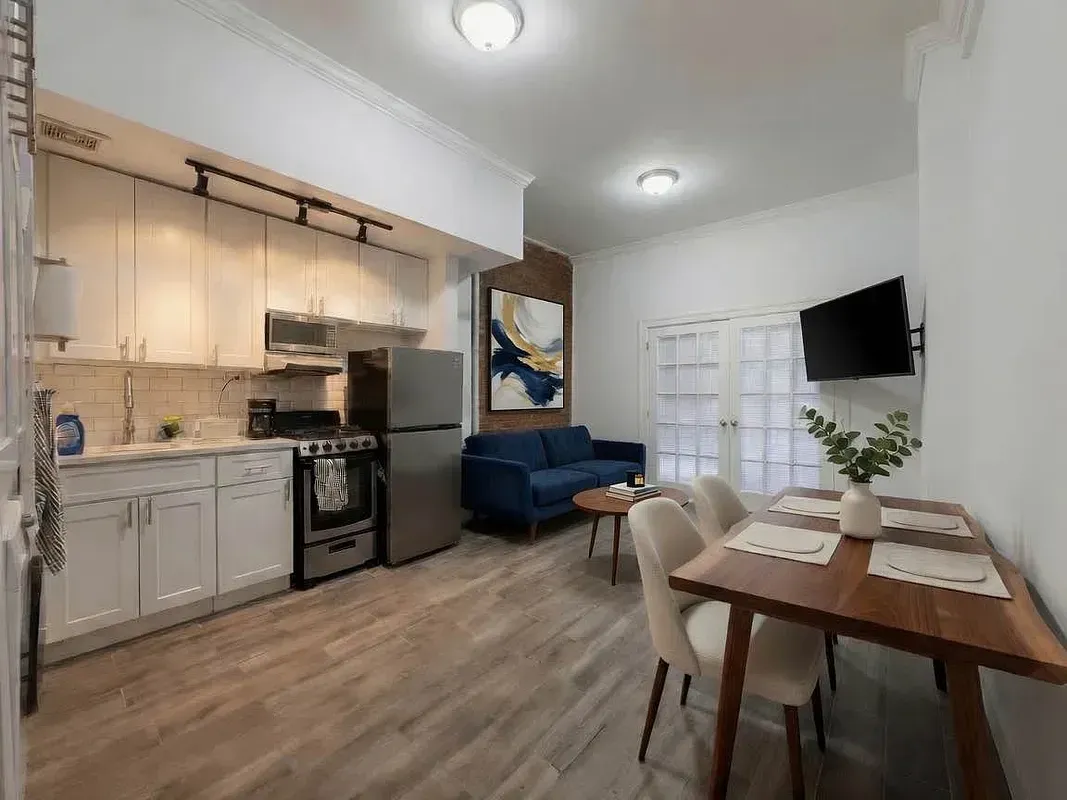 Two bedroom at 13 Saint Marks Place, open kitchen and dining table