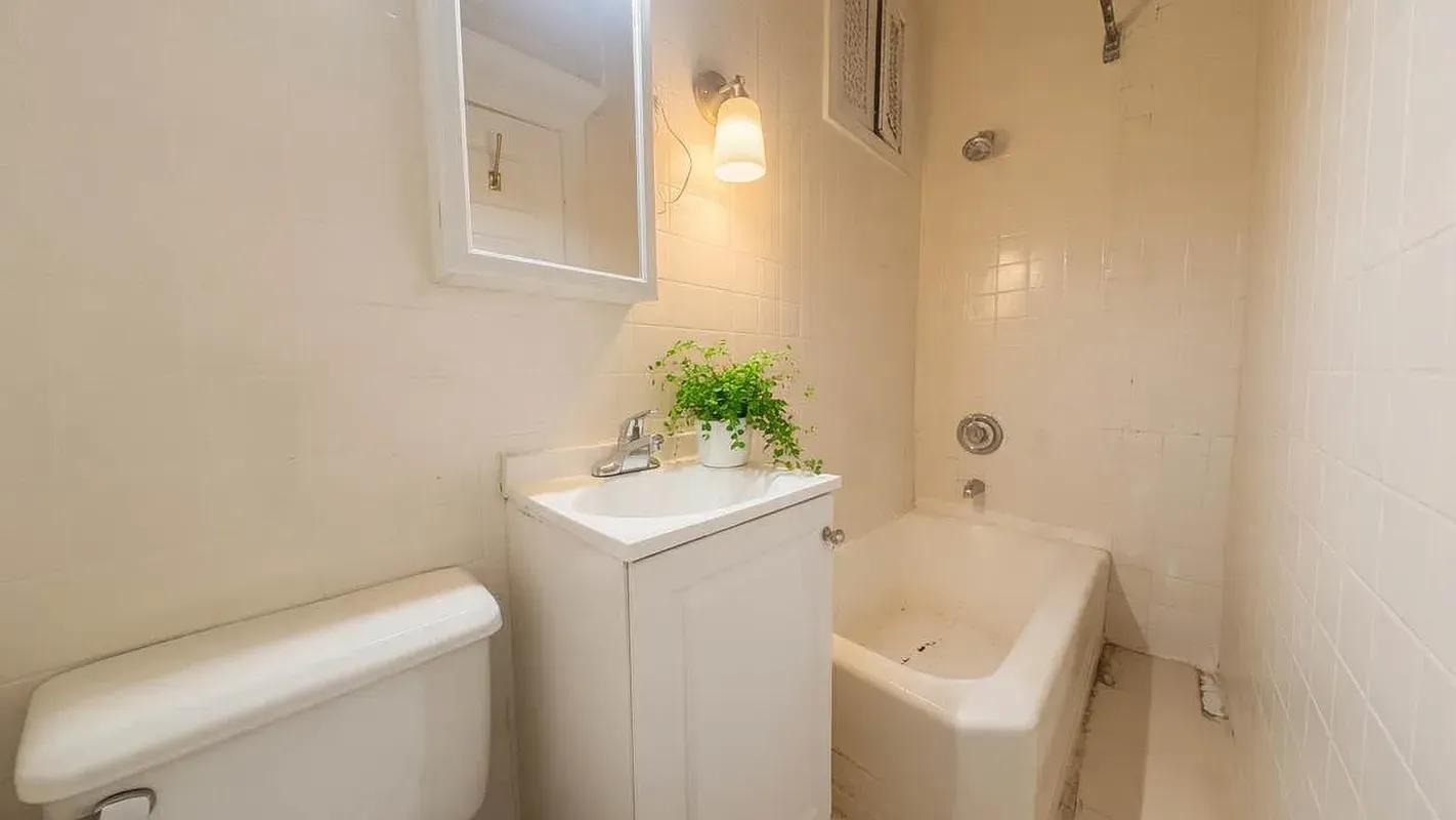 Two bedroom at 13 Saint Marks Place, bathroom with tub and vanity
