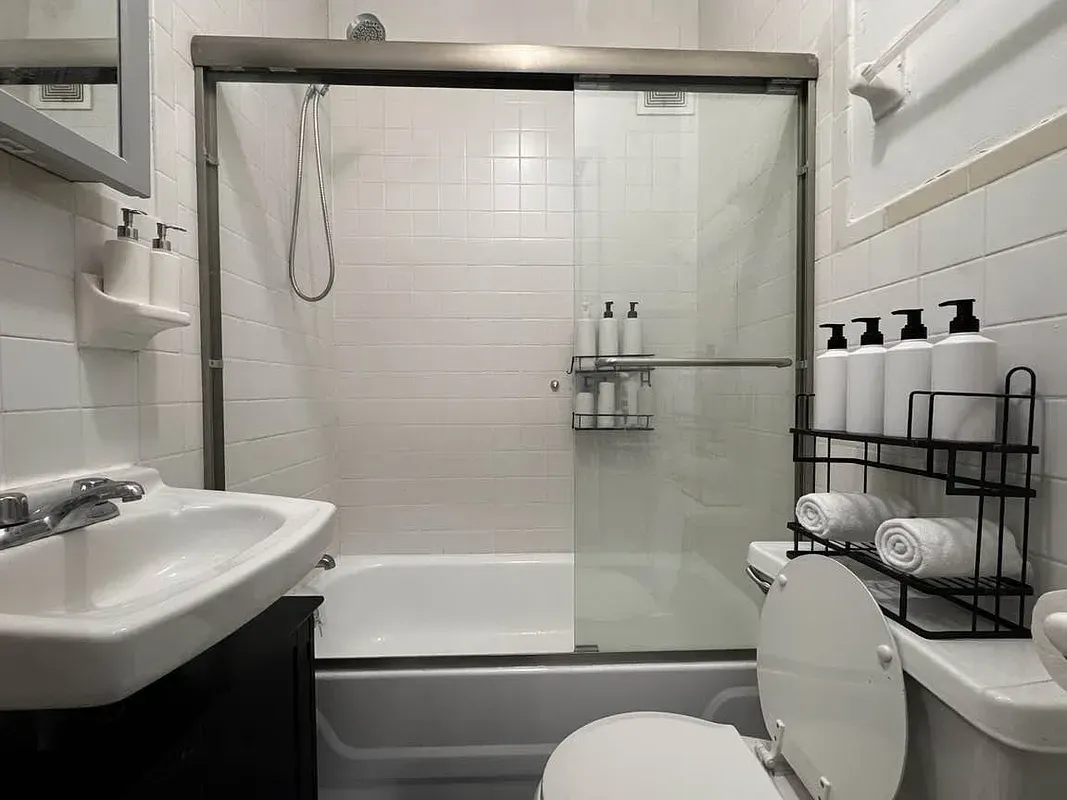 Two bedroom at 17 Saint Marks Place, bathroom with glass shower door