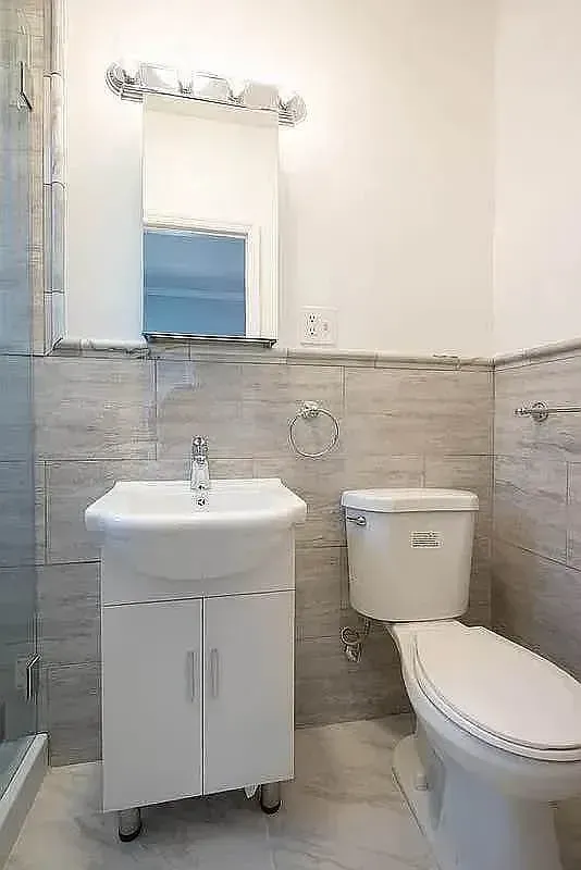 Three bedroom at 34½ Saint Marks Place, bathroom with vanity