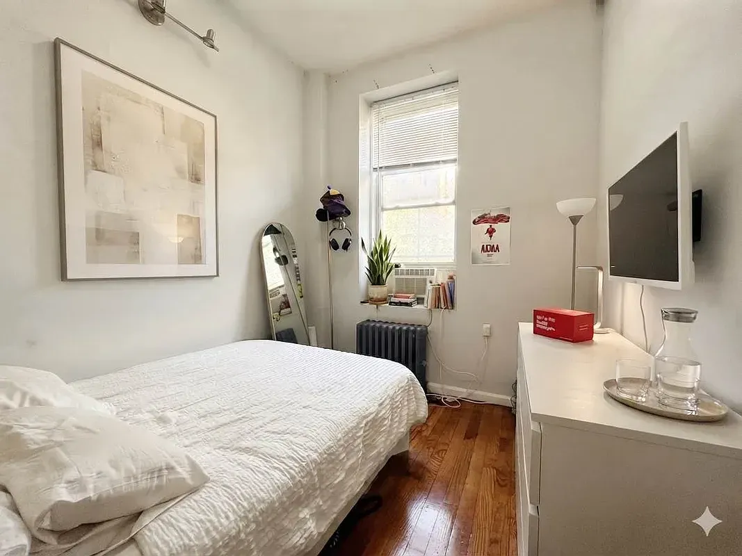 Three bedroom at 34½ Saint Marks Place, bedroom with window and radiator
