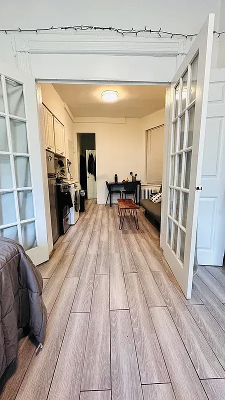 Three bedroom at 17 Saint Marks Place, hallway with French doors