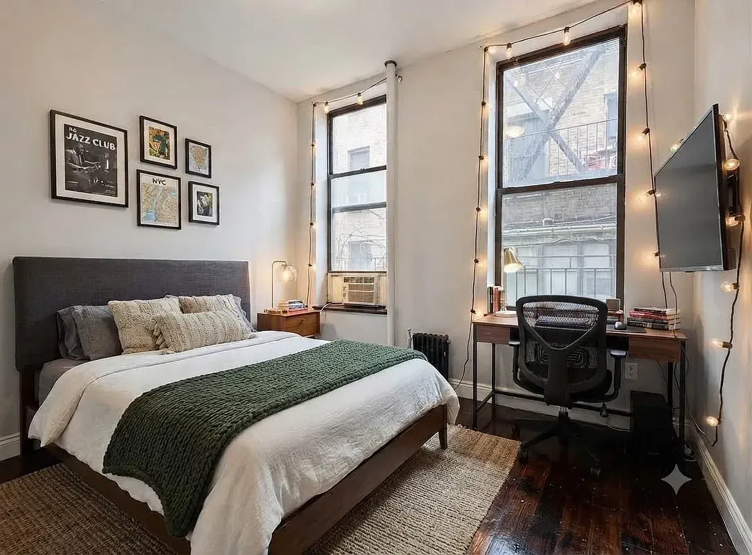Four bedroom at 13 Saint Marks Place, bedroom with desk and two windows