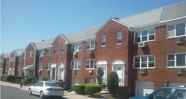 Bell Boulevard, attached brick houses in Bay Terrace