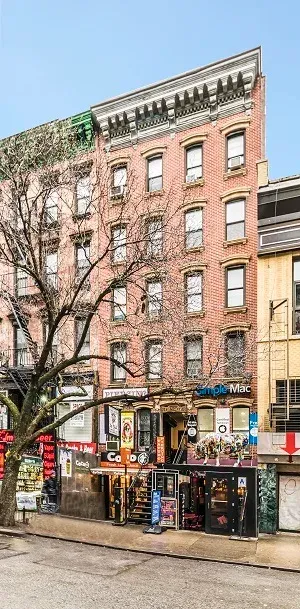 33 Saint Marks Place, a brick building behind a tree