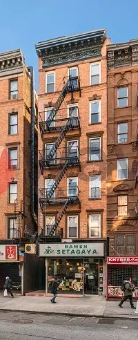 34½ Saint Marks Place, a brick building with a fire escape
