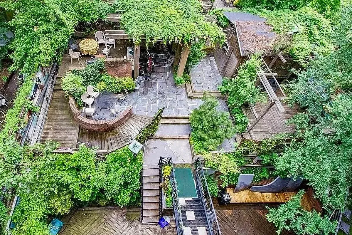 Shared garden at 518 East 6th Street, seen from above with deck and trees